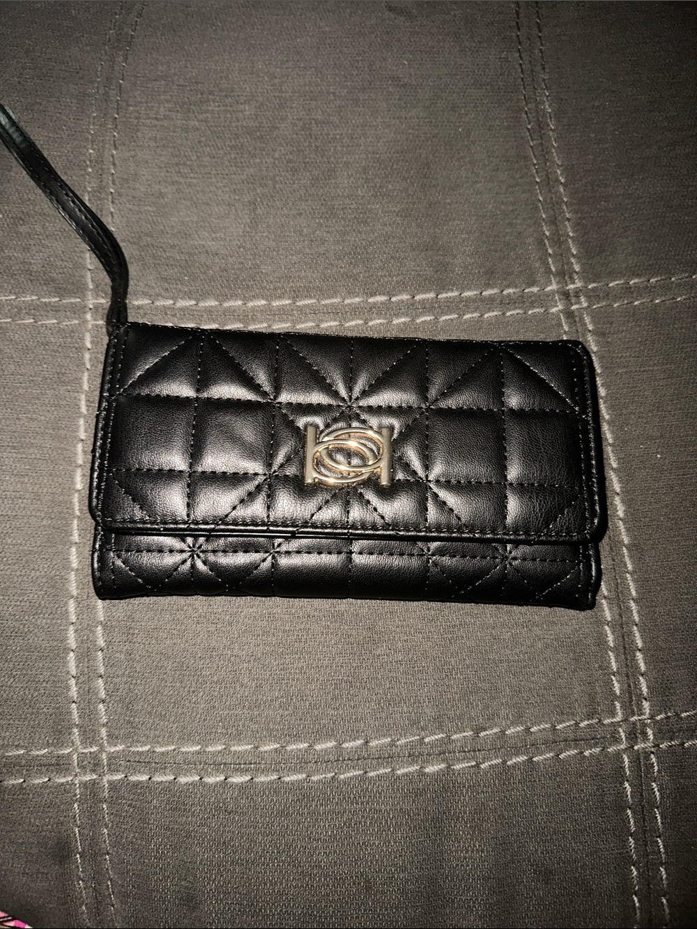 bebe Black Quilted Leather Wallet with Gold Zip Accent